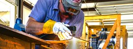 Technician using Plasma Cutting Tool